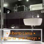Design del bagno in nero con pavimento bianco