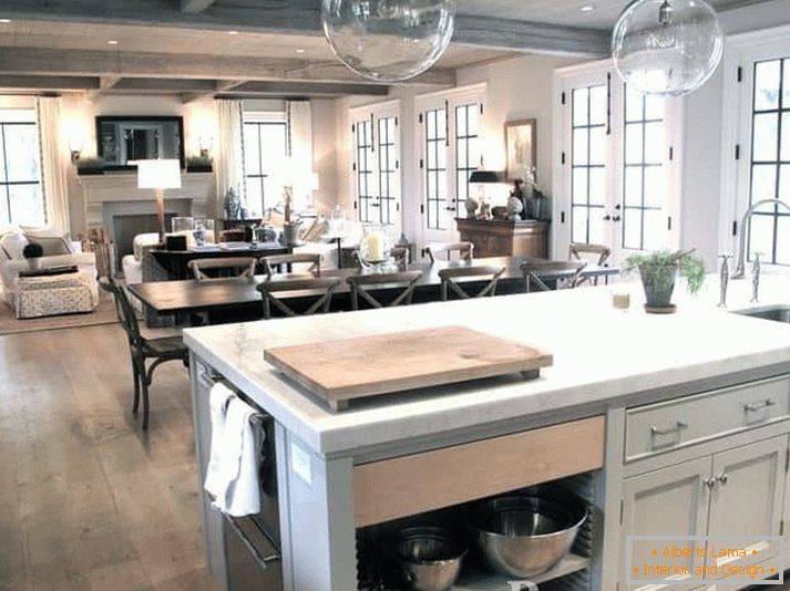 Esempio di illuminazione combinata cucina-sala da pranzo e soggiorno