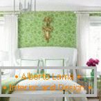 Elegante camera da letto nei colori verde e bianco