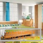 Sfumature di verde e giallo nel design della camera da letto