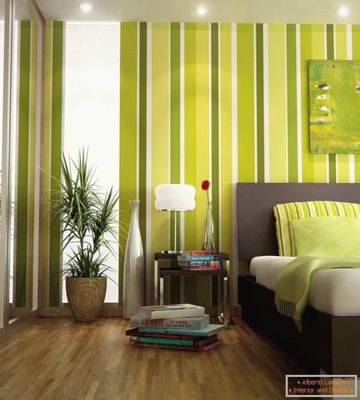 Interno di una piccola camera da letto in colori verde