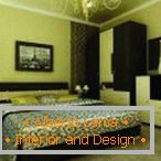 Interno elegante della camera da letto nei toni del verde e del marrone