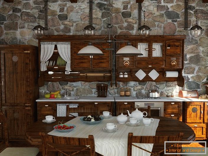 Per arredare la cucina di campagna è stato scelto un set di legno color wengè.