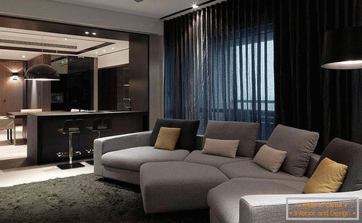 Il soffitto e le pareti della stanza sono monocromatici high-tech, i mobili sono necessariamente sotto il colore principale della stanza.