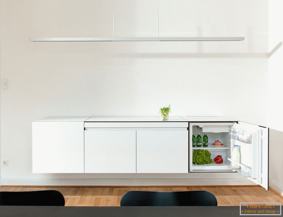 Design elegante della cucina di piccole dimensioni - зелень на столике