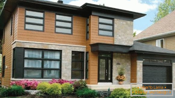 Rifiniture di facciate di case private con pannelli di facciata - foto di pannelli di legno