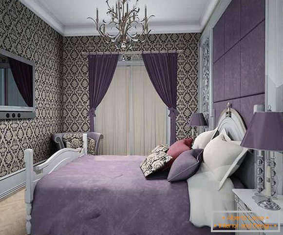 Camera da letto nei toni del viola - foto con carta da parati a motivi geometrici