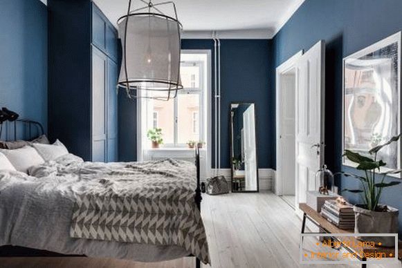 Foto della camera da letto in stile moderno e di colore blu