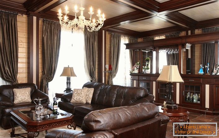 Una camera per gli ospiti chic con un bancone bar. L'attenzione attira un enorme mobilio imbottito, scorticato. 
