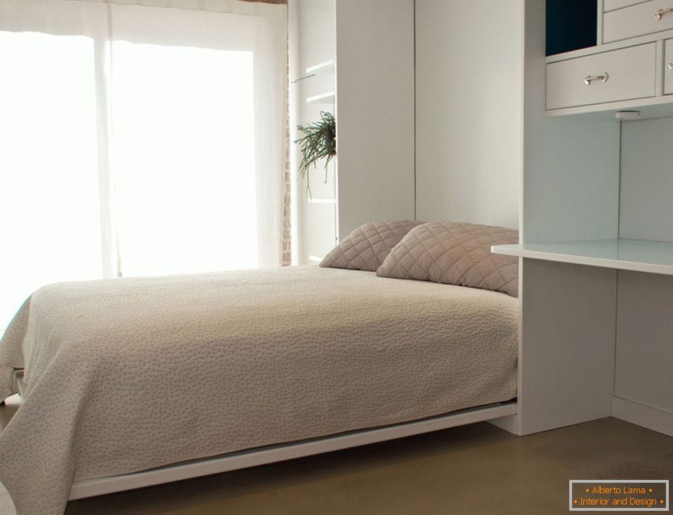 Camera da letto di confortevoli appartamenti piccoli