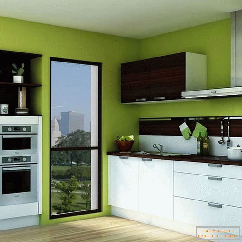 Colore verde brillante delle pareti e cucina bianca
