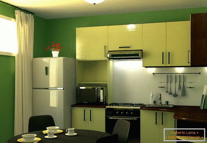 Il verde è il colore della tranquillità e dell'armonia. Area cucina di 9 mq in questa combinazione di colori - una soluzione eccellente per la progettazione di qualsiasi appartamento di città.