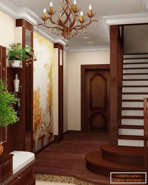 Progettazione di un piccolo corridoio in una casa privata con una scala al 2 ° piano