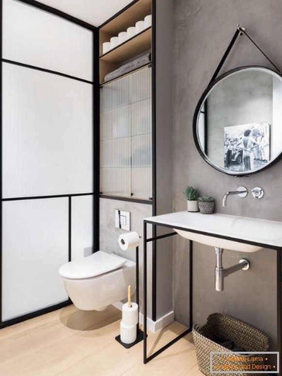 Interiore della toilette del loft - foto con un gabinetto sopra la toilette