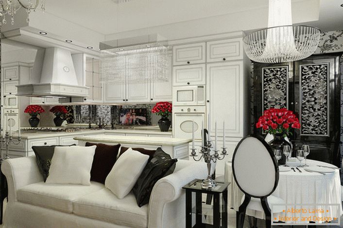 Cucina-soggiorno in stile art déco con suite bianca e elettrodomestici da incasso.