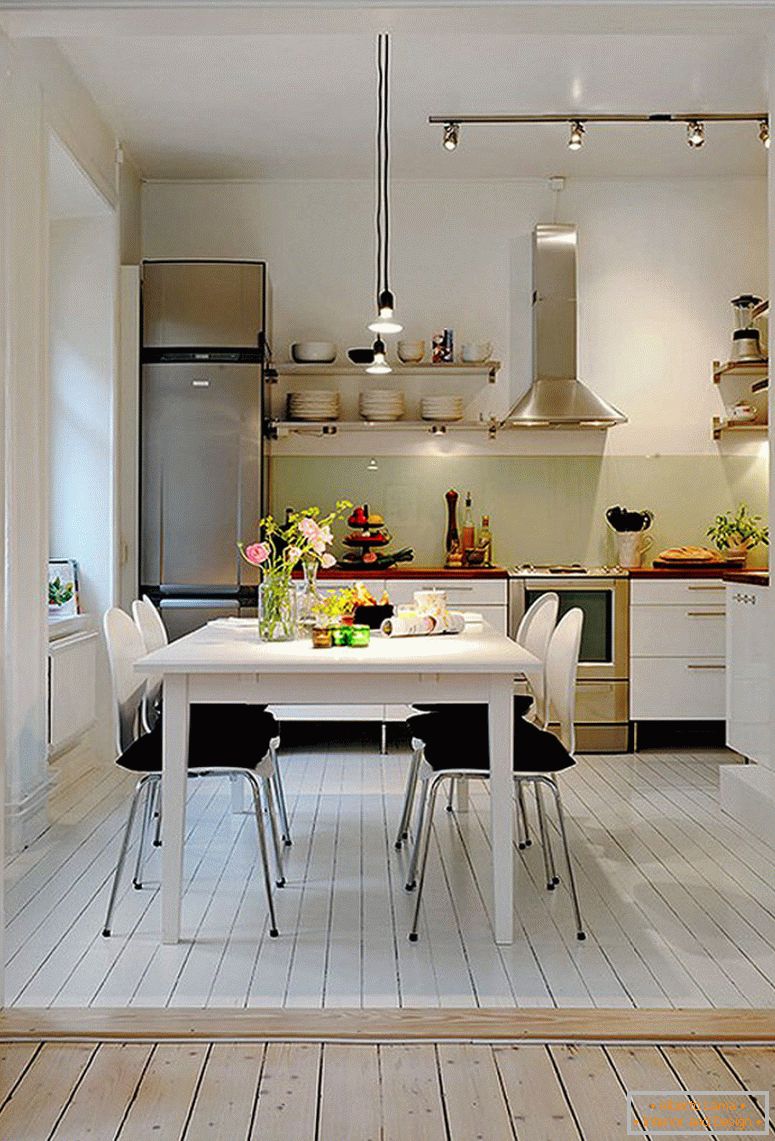 retro-bianco-design-for-a-piccole-cucina-plus-track-lighting-anche-nero-sedia-pad pranzo-design