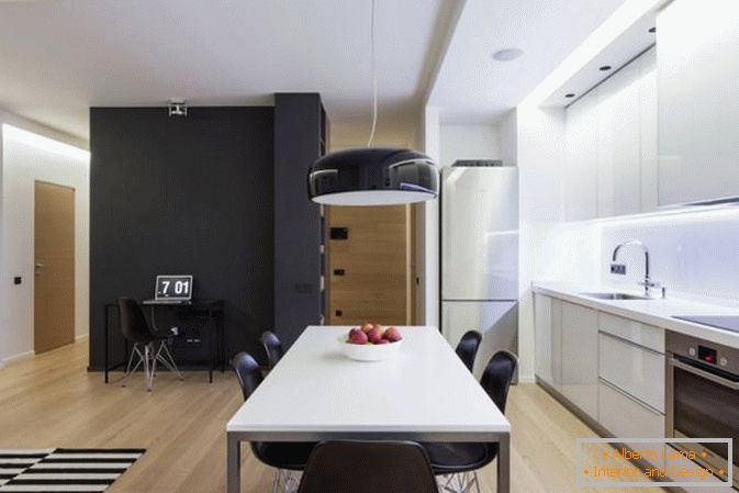 Cucina e sala da pranzo nell'appartamento monolocale