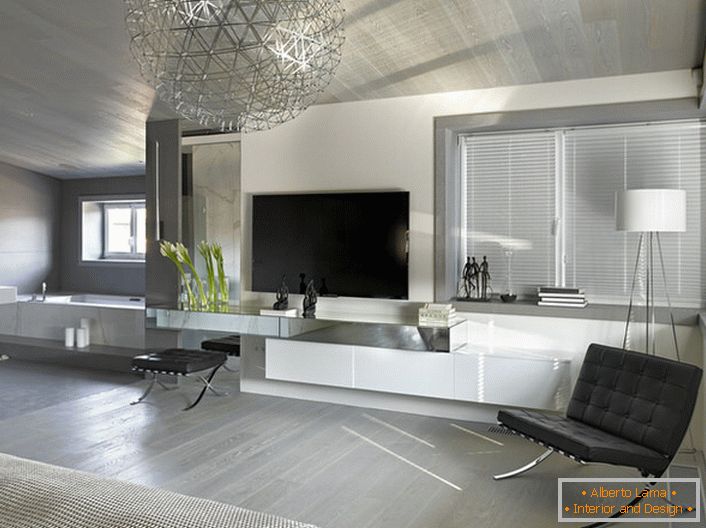 Una caratteristica dello stile minimalista è l'uso di un materiale monocolore per la tappezzeria di mobili e elementi cromati in metallo.