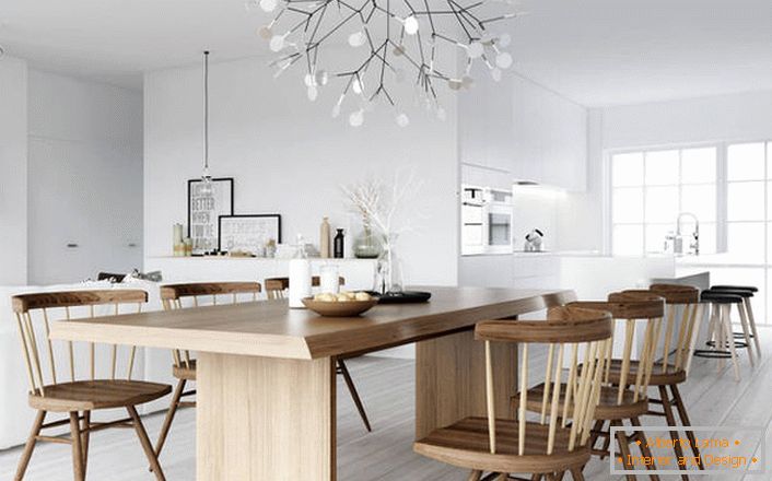 Un'elegante sala da pranzo nello stile del minimalismo scandinavo.