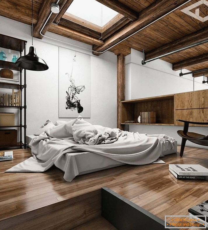 Camera da letto con una finestra sul soffitto