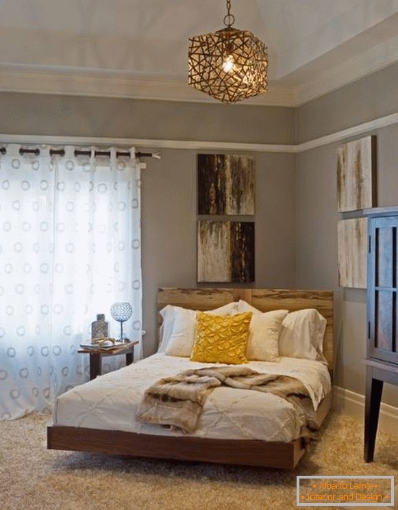 Design della camera da letto accogliente con motivi rustici