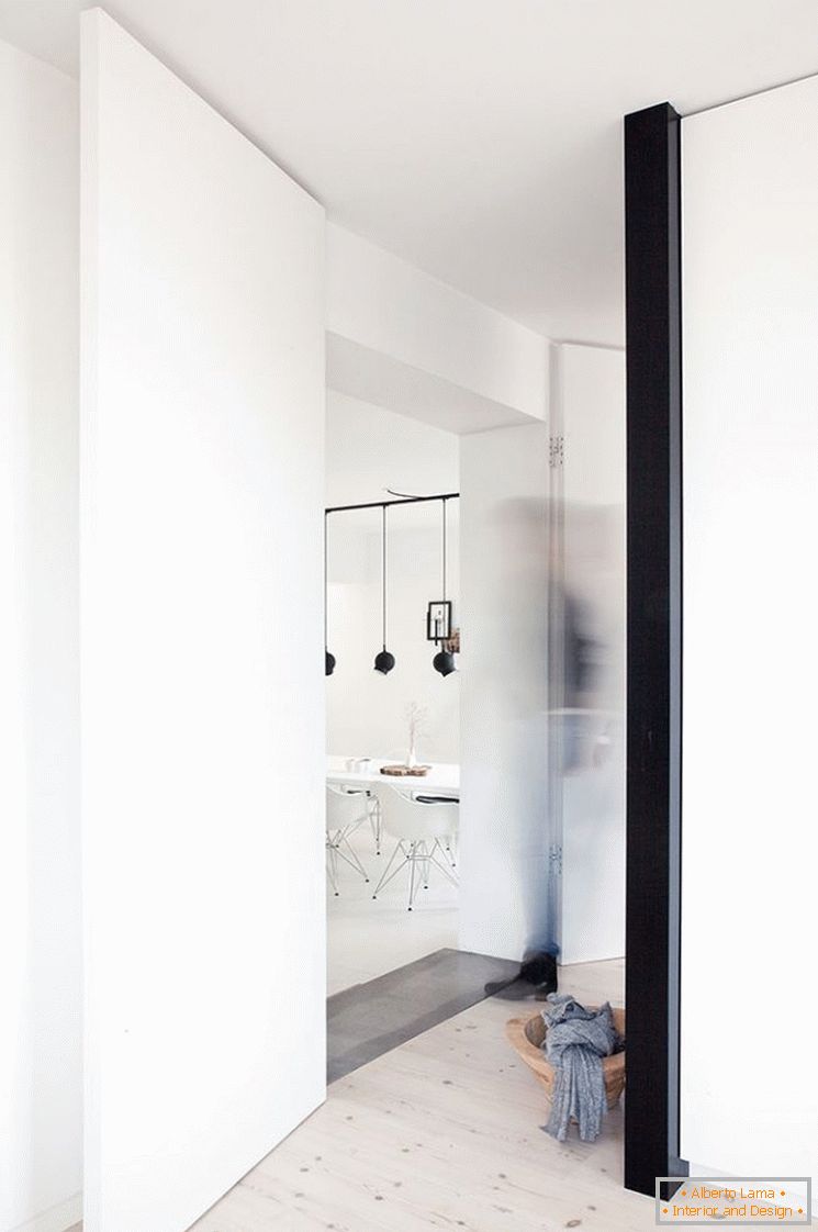 Progettazione di un piccolo appartamento in bianco e nero - фото 2