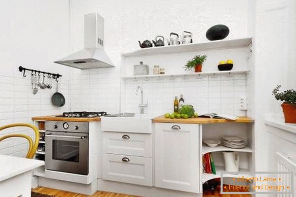 Фото необычного eнтерьера кухнe в белом цвете