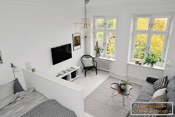 Appartamento con una camera in stile scandinavo - soggiorno e camera da letto