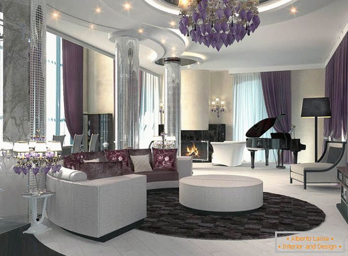 Il soffitto a più livelli con illuminazione a punti completa la composizione in stile Art Deco in cui è realizzato il soggiorno. 