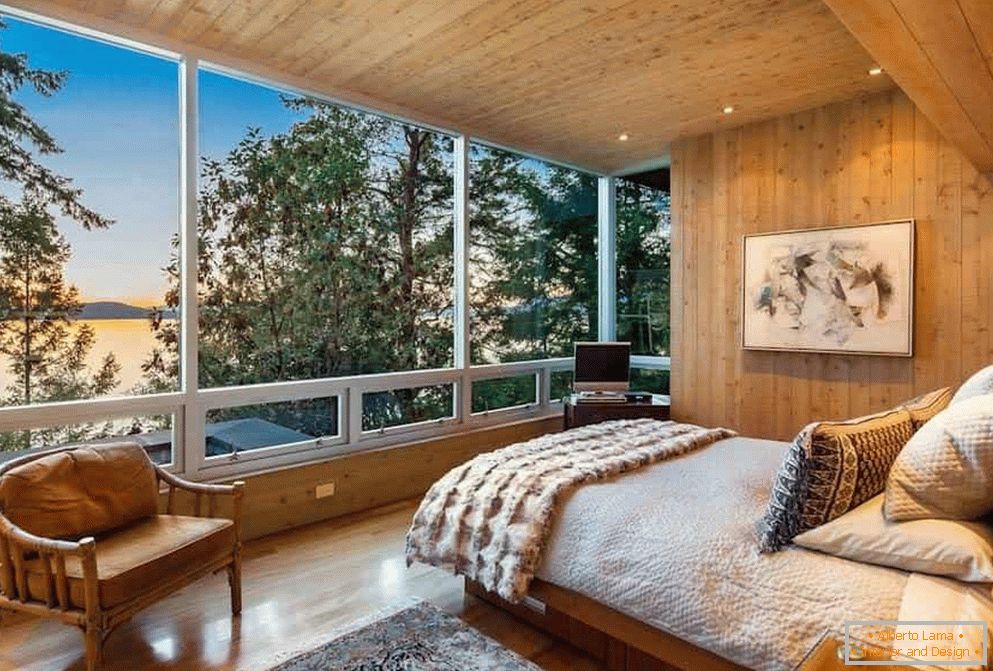 Camera da letto in una casa di legno