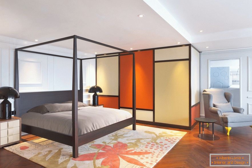 Camera da letto arancione di un elegante monolocale a Pechino